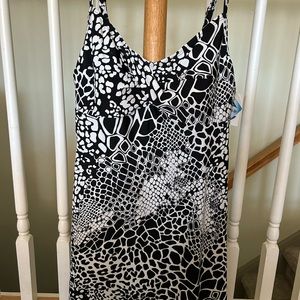 Womens swimdress size14. New, never worn. Protective liner in place.